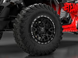 A closeup shot of the TIS-UT1 tire on a red and black UTV featuring TIS OFFROAD wheels