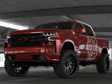 A red Chevy Silverado featuring the TIS logo with TIS-TT1 tires and TIS OFFROAD wheels